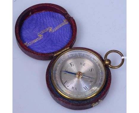 A Stanley leather-cased pocket compass