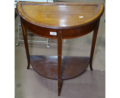 A mahogany demilune and ebony-banded side table, with a rising panelled lid and shelf under, W60cm 