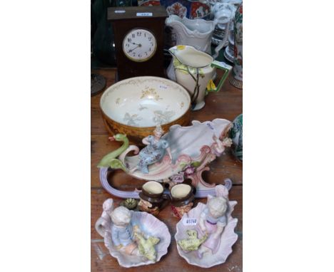 An Art Deco jug, bisque figures, a clock etc