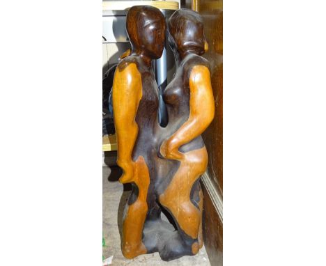 A carved hardwood group of 2 figures, stamped R W Goodall NDD ATD 