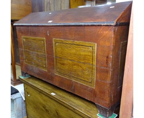 A 19th century Continental painted pine blanket chest, with canted top and bracket feet, W102cm