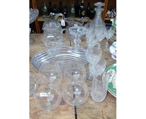 A cut-glass decanter and stopper, a cut-glass jug, goblets etc