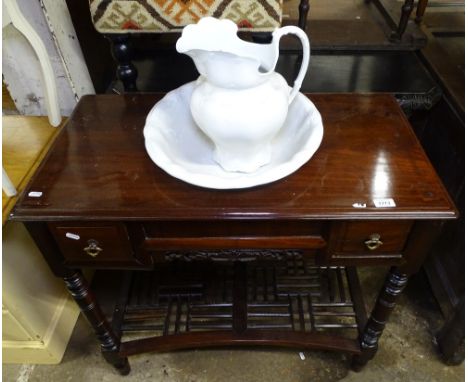 An Oriental design hardwood washstand, with fitted drawers, wash jug and basin