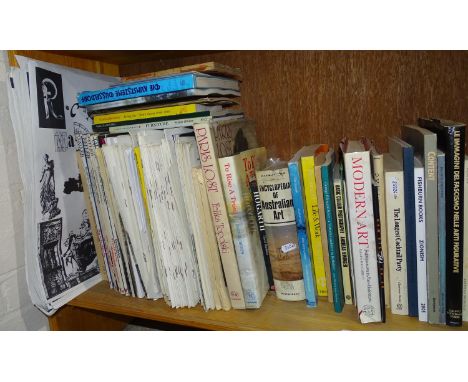 A shelf of art reference books etc