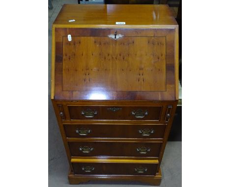 A reproduction cross-banded yew wood bureau, of narrow size, 4 graduated drawers, on bracket feet, W50cm