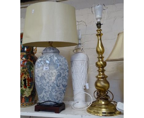 An Oriental table lamp and shade, 30", a white pottery table lamp, and a brass lamp