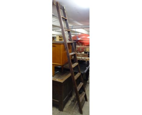 A Vintage stained pine library 8-rung ladder