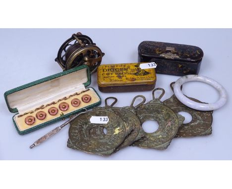 A tobacco tin, a jade bangle, cased studs, horse racing brasses etc