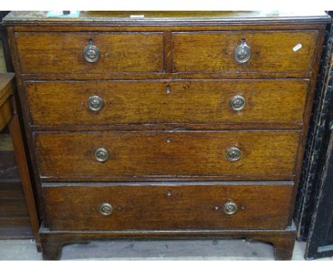 A Georgian oak chest of 2 short and 3 long drawers, on bracket feet, W92cm