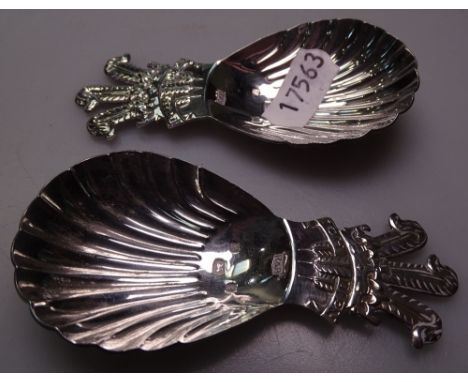 A pair of modern silver tea caddy spoons, decorated with the Prince of Wales feathers