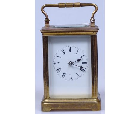 A brass-cased carriage clock, height 5"
