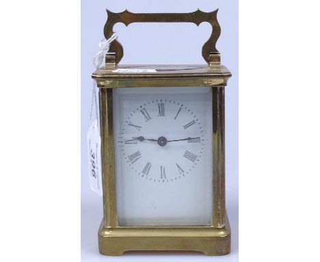 A brass-cased carriage clock, height 4.25"