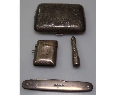 An engine turned silver cigarette case, a silver vesta, a silver cased cigarette holder, a silver mounted penknife, 3.3oz gro