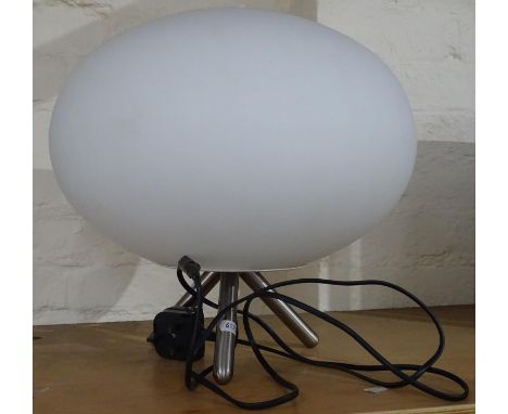 A table lamp on tripod base, with elliptical glass shade