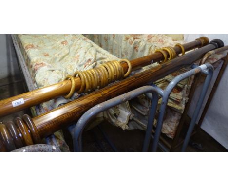 2 pairs of green lined floral curtains, and a single lined curtain, 2 pine curtain poles and rings, curtain pole lengths 245c