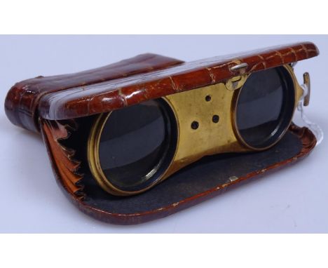 A Vintage French leather-cased gilt-brass opera glasses