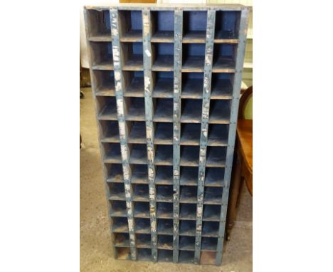 A Vintage painted pine bank of 60 pigeon holes, W56cm, L125cm 