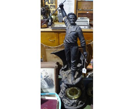 A clock surmounted by a patinated spelter seaman figure, height 29"
