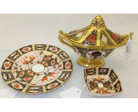 Three pieces of Royal Crown Derby to include an oval sucrier and cover, a plate and a trinket dish CONDITION REPORTS Finial t