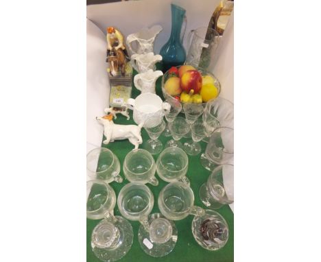 A collection of various glassware to include three rummers, various drinking glasses, glass candlesticks, fruit bowl, jugs, a