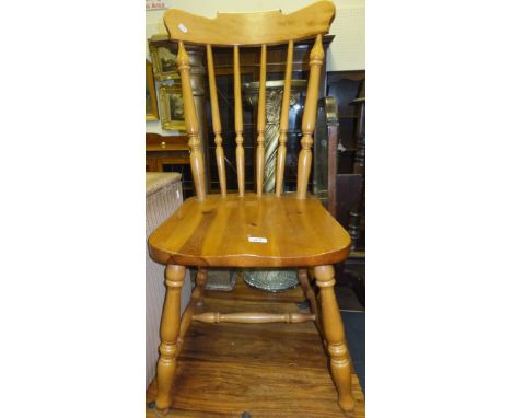 Four modern pine and beech stick back kitchen chairs