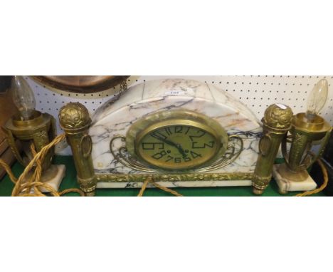 A 1930's French marble cased clock, the eight day movement with oval brassed dial inscribed "Martin Nimes", together with gar