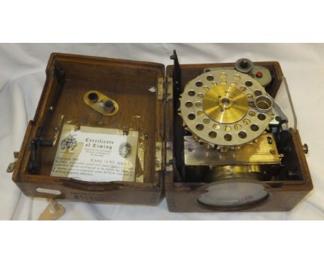 An Easyway pigeon racing clock in an oak case, No'd 106148
