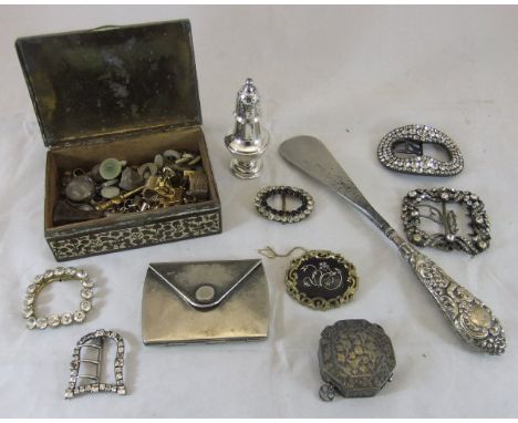 A box containing assorted paste buckles, an Indian metal box containing various cufflinks, studs, etc, a plated compact in th