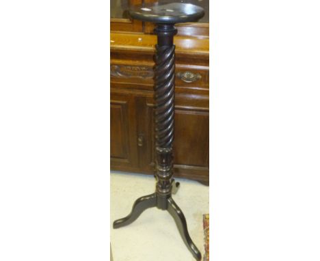 A Victorian mahogany and barley twist carved plant stand on tripod base (bed post conversion)