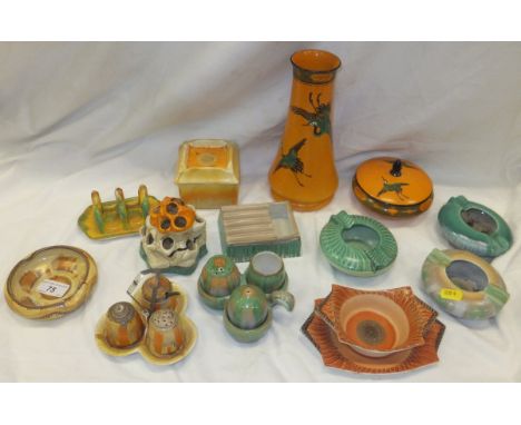 A collection of Shelley pottery wares with dripware and concentric circle decoration etc, to include two cruet sets, toast ra