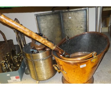 A quantity of various copper and brassware including copper coal helmet, warming pan with bamboo handle, various fireside too