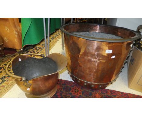 A Victorian copper copper of typical studded form, and a copper coal helmet