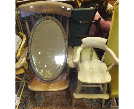 An early 20th Century carver stick back kitchen chair, an oval wall mirror, a child's high chair, and a bedroom chair with up