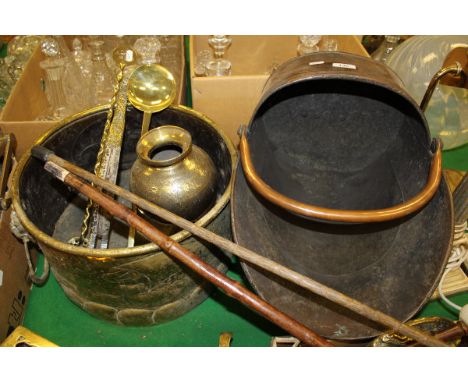 A copper coal scuttle, Dutch brass jardinier, pair of brass mounted bellows, Indian brass pedestal vase, toasting fork, ladle