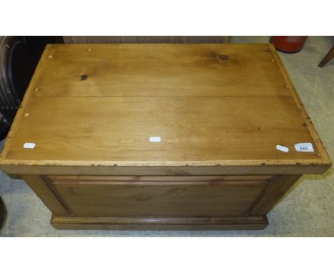 A small rectangular pine trunk