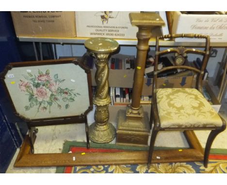 A collection of furniture comprising two gilt decorated stands, an oak fire surround, a tapestry fire screen/table and a dini