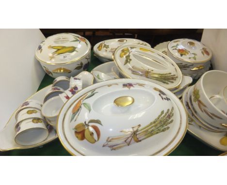 A collection of Royal Worcester "Evesham" pattern dinnerwares to include lidded tureens, serving dishes and ramekins