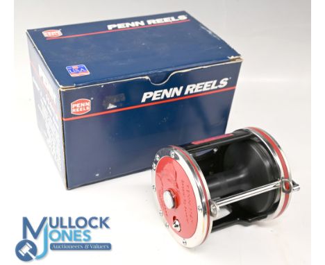 Penn Senator 114H LW, 6/0 multiplier reel, little used condition, red end plates, black spool, c/w saddle clamp, instructions