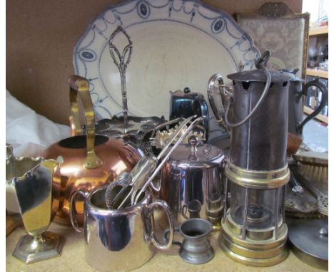 A Miners lamp together with an electroplated hot water pot, dressing table set, pottery meat plate etc