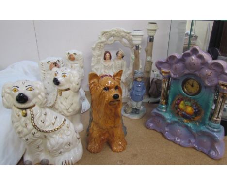 A Staffordshire flatback figure together with a pair of Staffordshire Spaniels, a pair of Royal Doulton Spaniels, Nao lamp, p