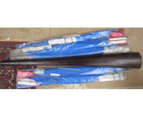 Five 1970's Peter Powell Stunter kites together with a didgeridoo type instrument 