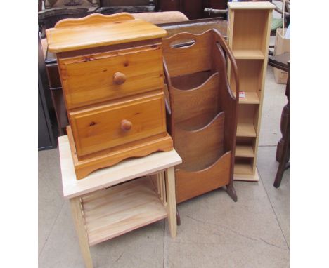 A waterfall bookcase together with a pine bedside cabinet, a CD rack and another shelf unit