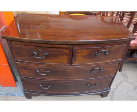 A 19th century mahogany chest with a bowed top above two short and two long drawers on bracket feet