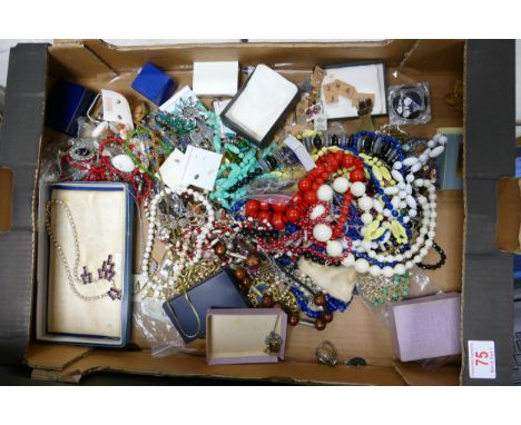 A collection of vintage costume jewellery including watches, beads, brooches, chains etc 