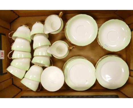 A Collection of Adderley Fine Bone China Teaware in a Green Fading and Gilt Pattern to include Eleven Side Plates, Twelve Sau