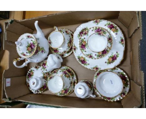 A collection of Royal Albert Seconds Old Country Rose Pattern tea ware including teapot, cups &amp; saucers, side plates, mil