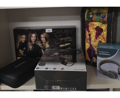 Shelf of electrical appliance s includes Carmen hair appliance set 