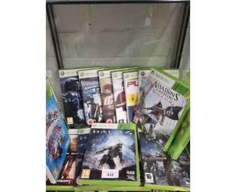 Shelf of xbox 360 games . 