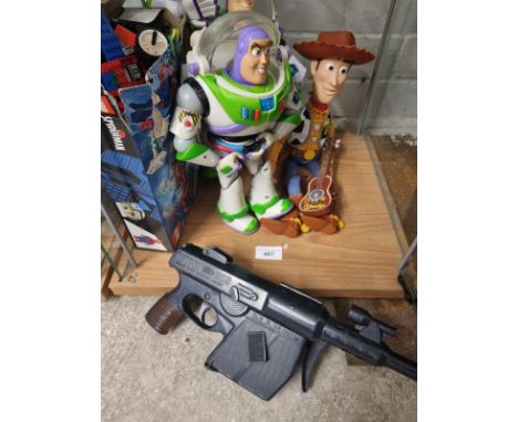 Shelf of Spiderman Lego , toy story toys together with Marx Toy gun. 