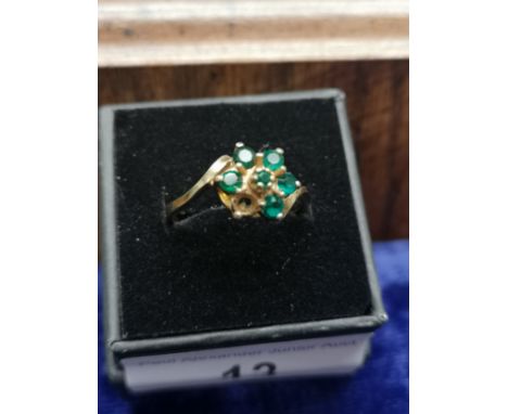 9ct gold green stone ring . 1 stone missing . size R. 